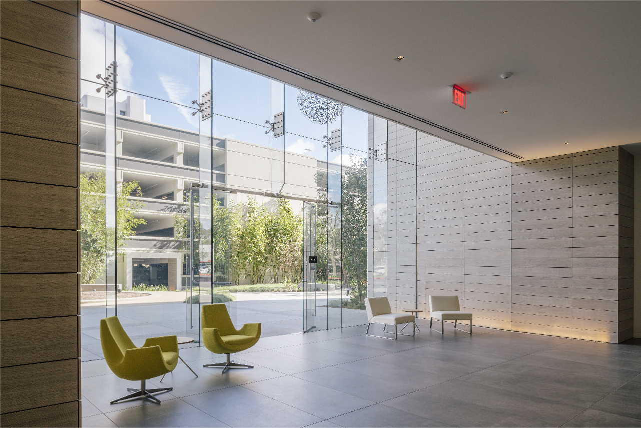 Pacific Center Entrances Connection between frameless glazing and Porcelain Cladding